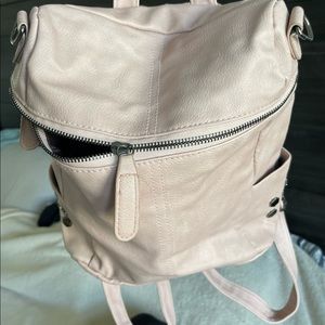 Victoria secret backpack studs on each side